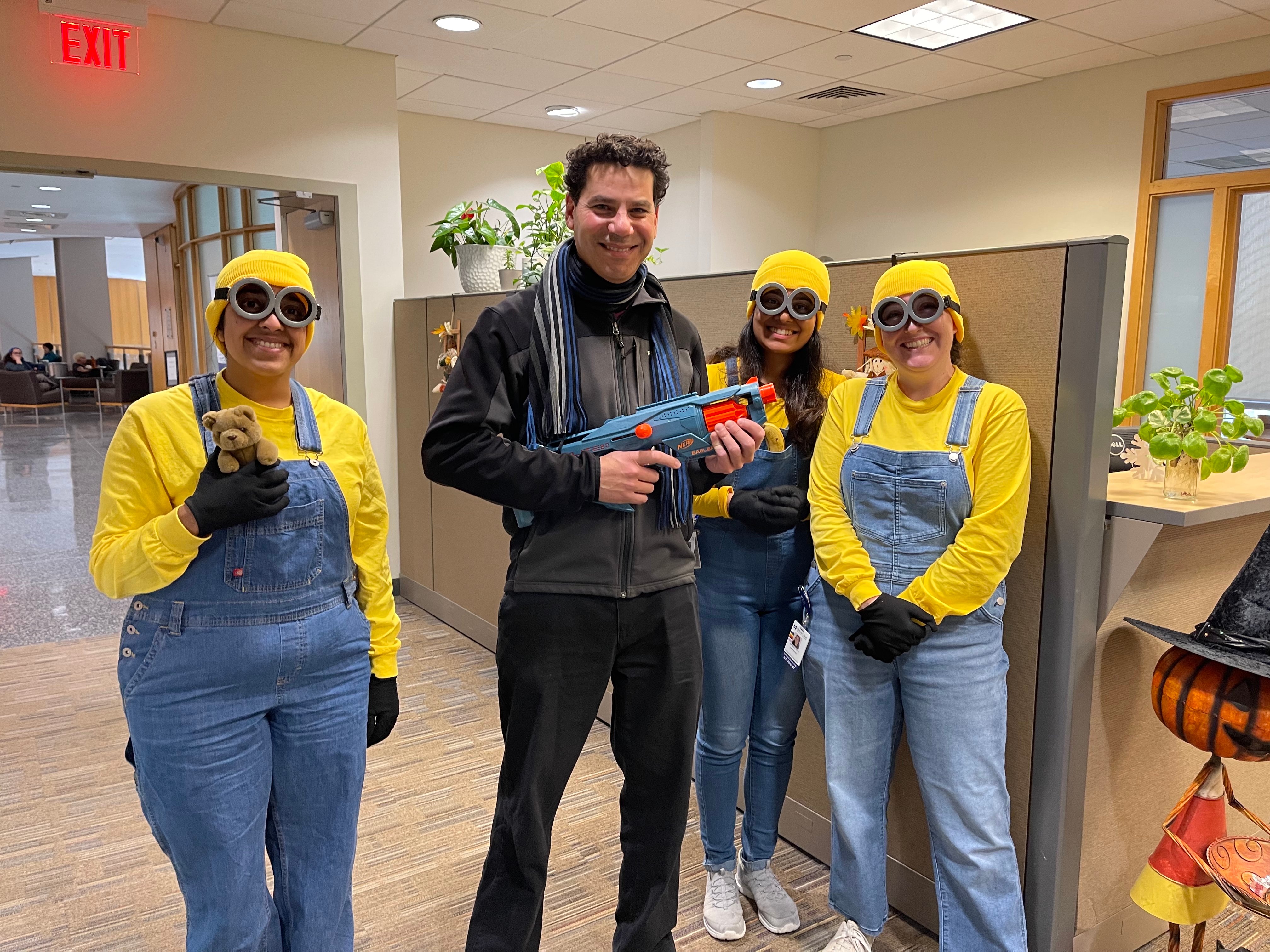 Lee Quinton and his lab members in Halloween costumes