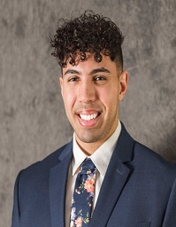 Male medical resident smiling