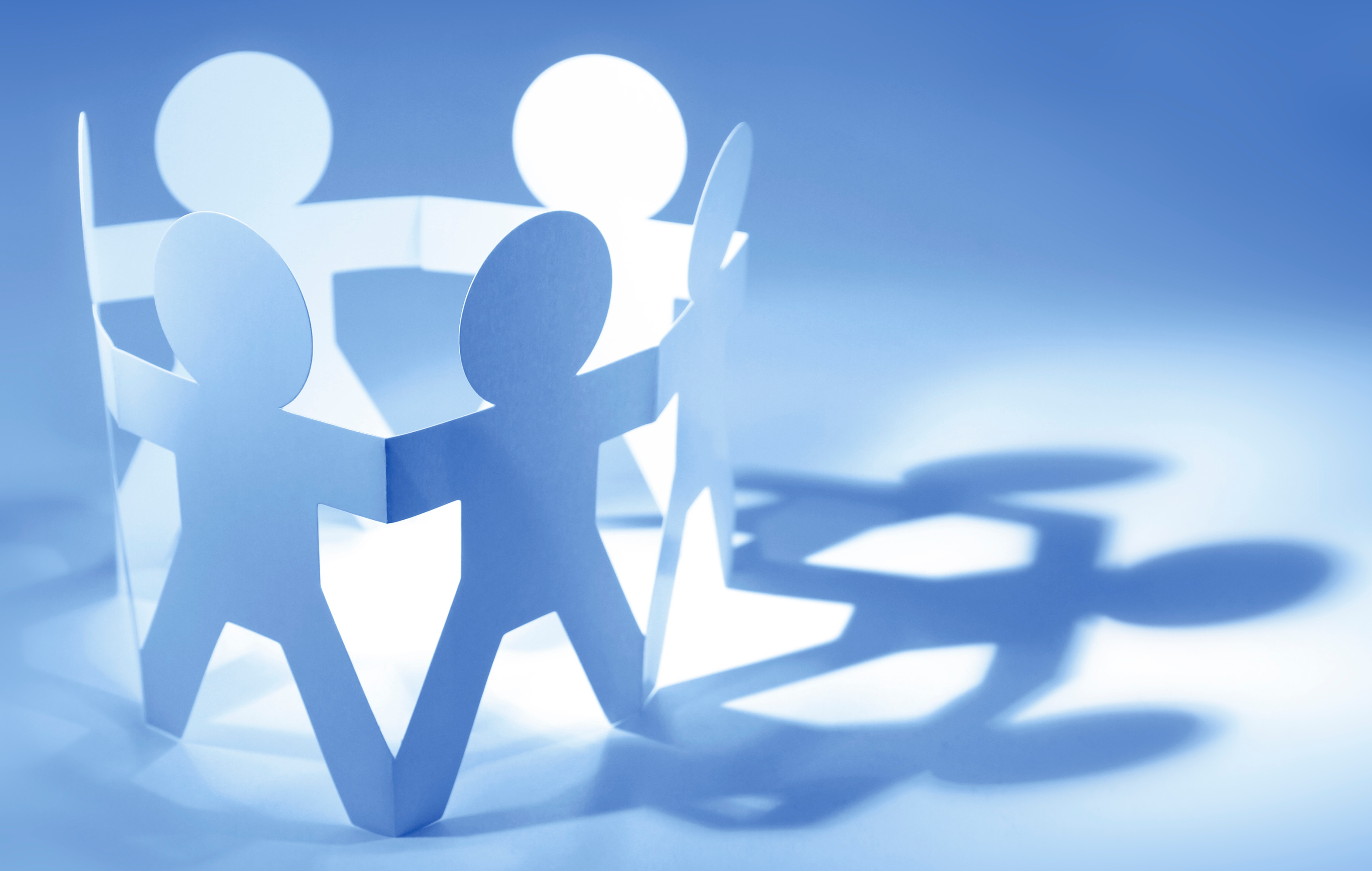 Image of paper figures in a circle