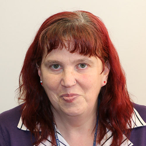 white middle aged woman with red hair