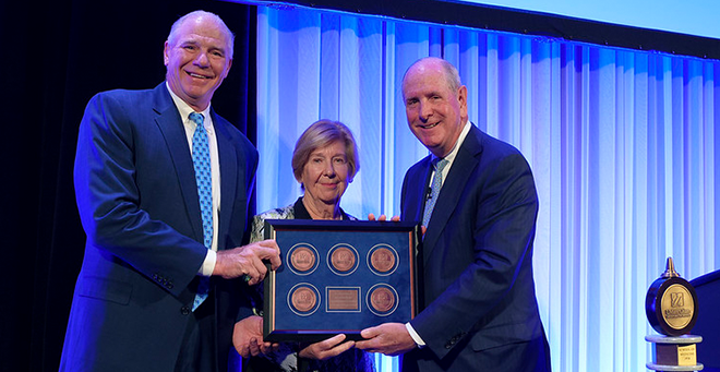 Eric Dickson, MD&rsquo;95, president and CEO of UMass Memorial Health, and Lynda Young, MD, chair of the UMass Memorial Health Board of Trustees, are presented with five medallions representing the five UMass Memorial Health Endowed Chairs. Photo: John Gillooly &nbsp;